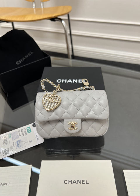 CHANEL small charm bag