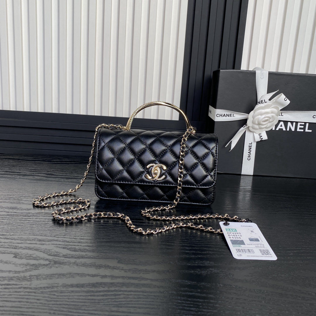 CHANEL accordion bag with rhinestone handle