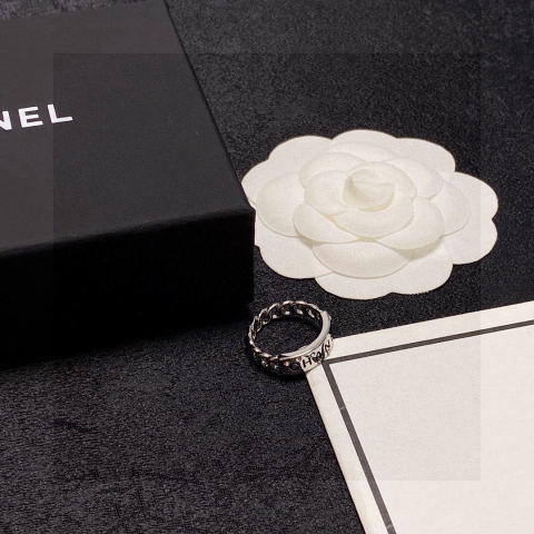 Chanel's double C logo ring with diamond design.
