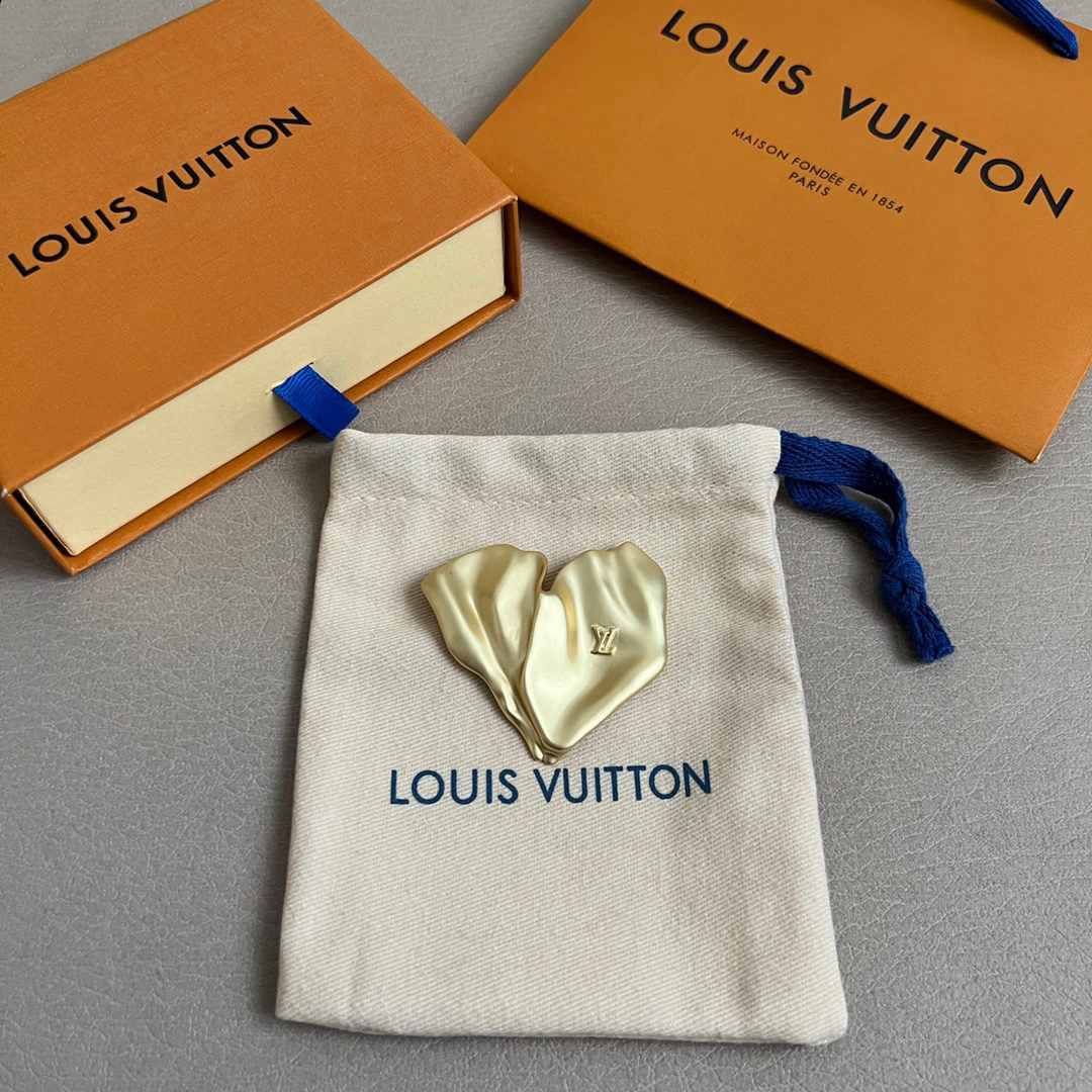 LV brooch