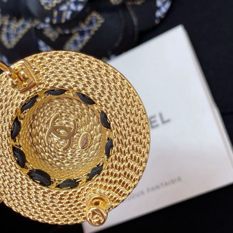 Chanel straw hat brooch
