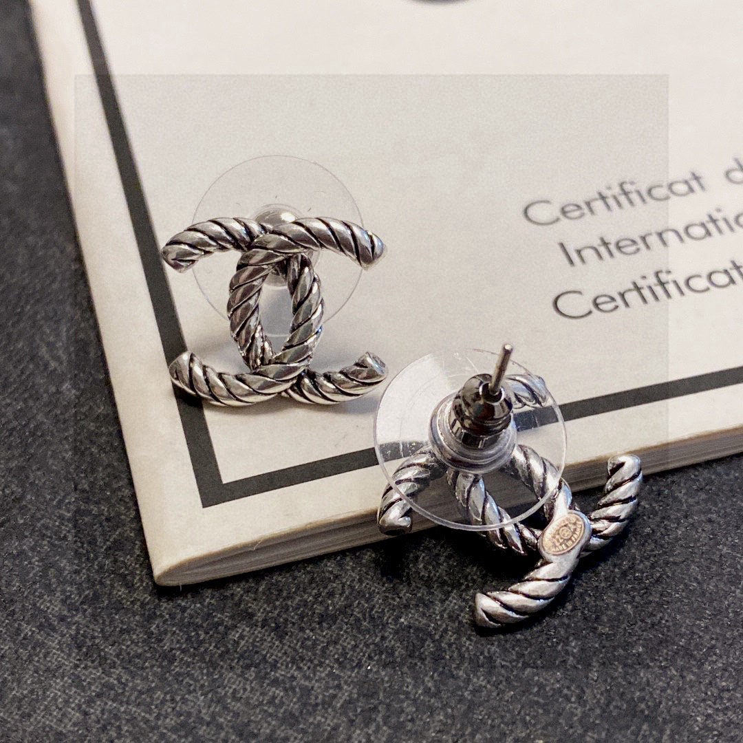 Chanel vintage silver stud earrings with the double C logo