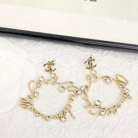 Chanel crystal lettering openwork irregular-shaped earrings